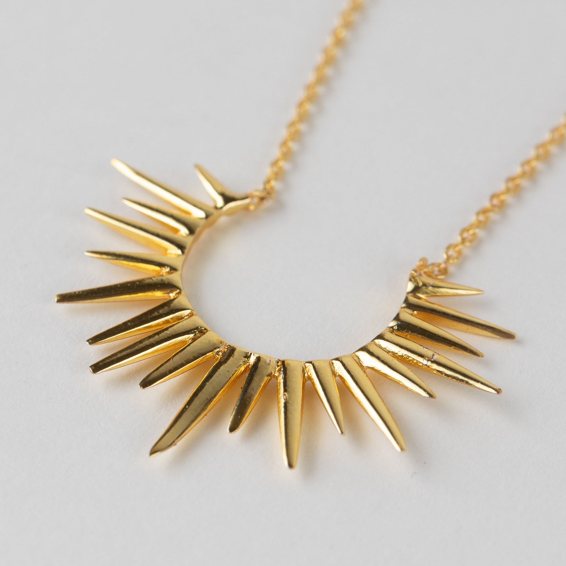 Kiranon Sunburst Gold Pendant Necklace