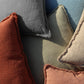 Organic Chic washed textured cotton solid lumbar pillow cover with frayed edges