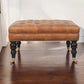 Solid Wood Studded Buffalo Leather Upholstered Ottoman