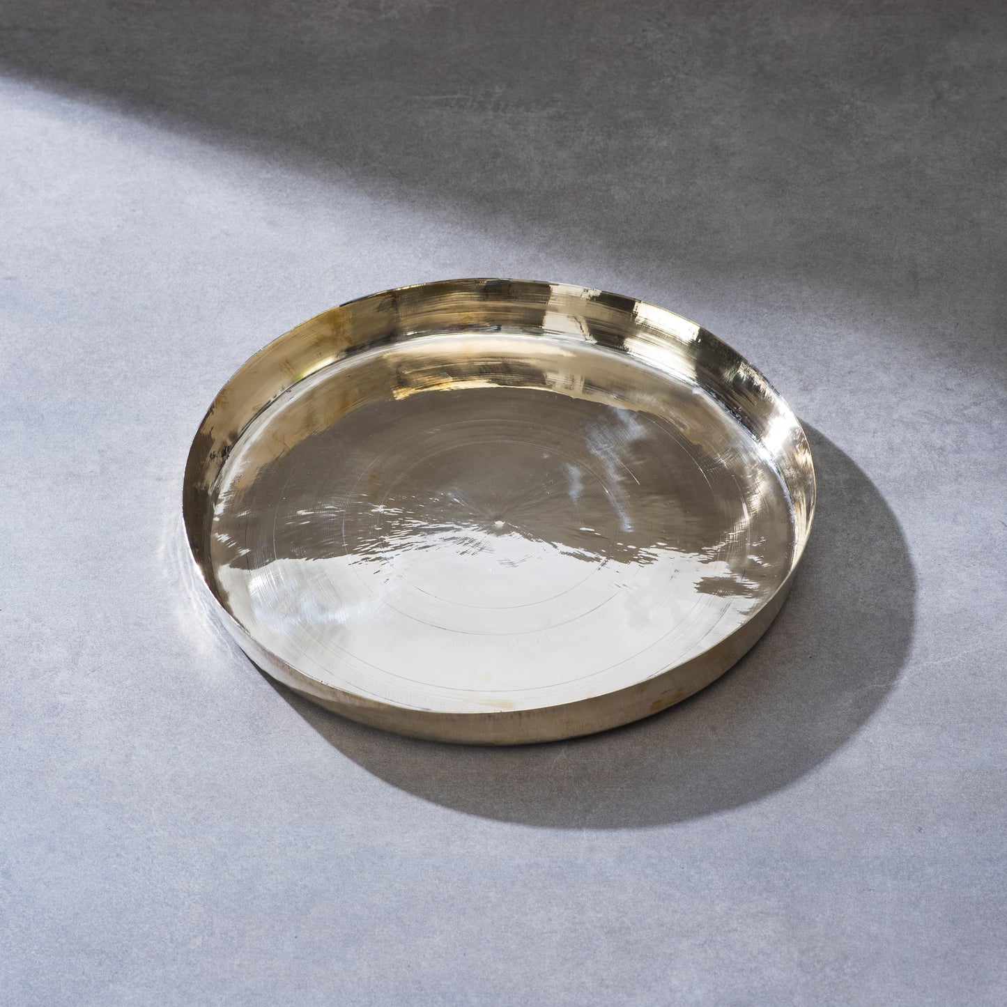 Bronze high hipped plate (Thaali)