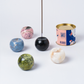 Gemstone sphere incense holder Celestine