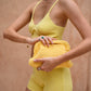 Cali Top Handle Knit Clutch in Butter Yellow