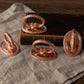 Vintage Inspired Copper Napkin Rings with Embossed Cross & Bow Pattern –